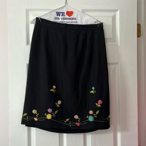 Black skirt with embroidered flowers